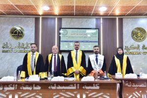 عميد كلية الصيدلة في جامعة الزهراء (عليها السلام) للبنات عضواً ومشرفاً في مناقشة رسالة ماجستير بجامعة الكوفة